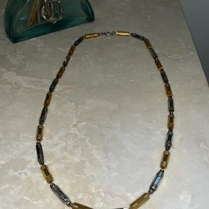 Silver with gold is very heavy necklace